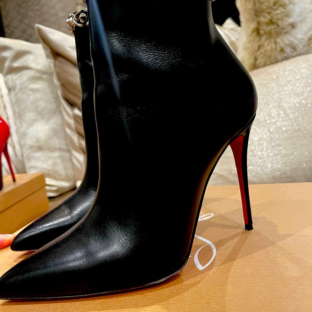 Christian Louboutin low rise boots. Elegant with some spice. Worn only once.